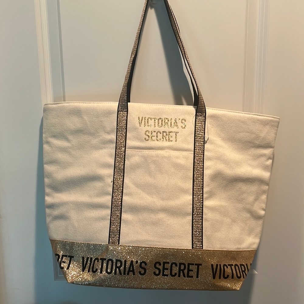 Never used gold large Victoria’s Secret tote